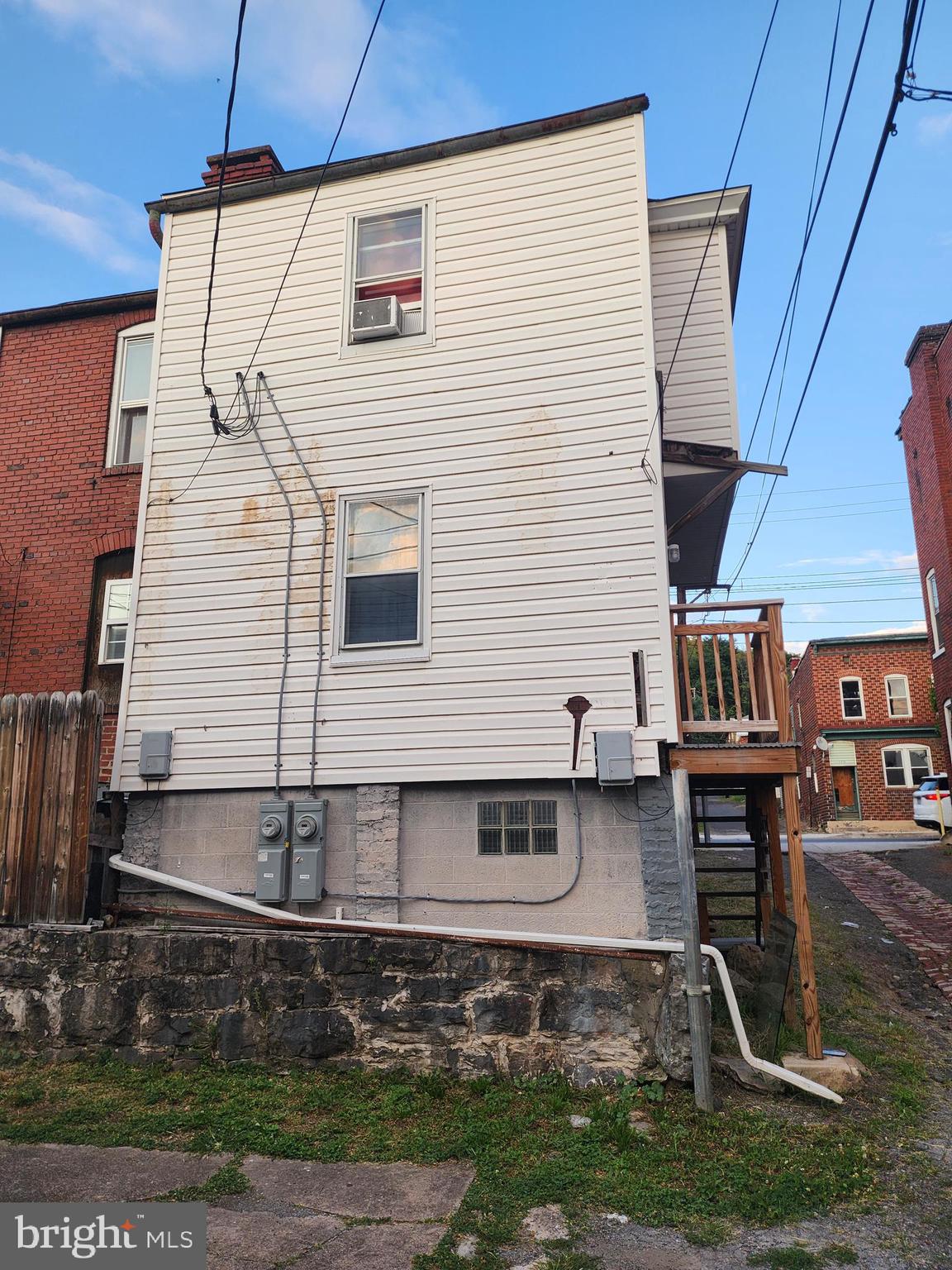 105 Park Street Cumberland, MD 21502 - Photo 17 of 18 a view of a house with a yard