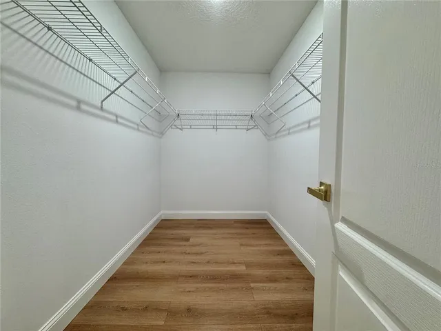 a view of a room with racks on the wall