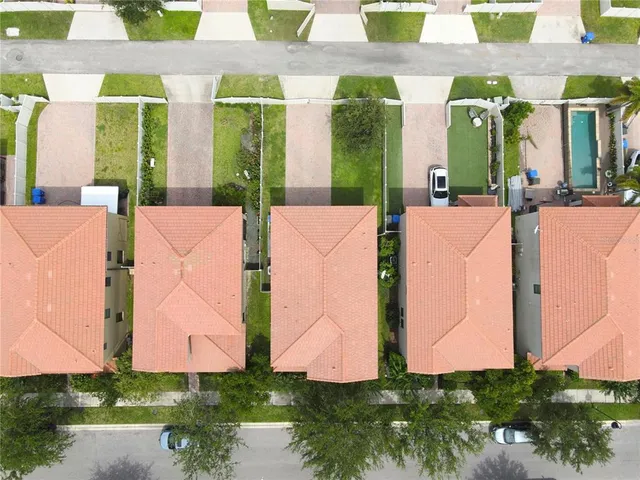 a view of a building with a yard