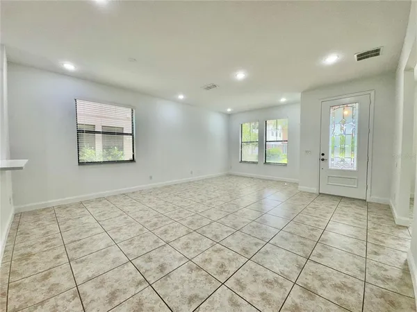 an empty room & window in a room