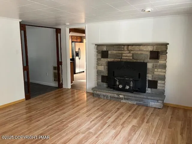 a view of a livingroom with a fireplace