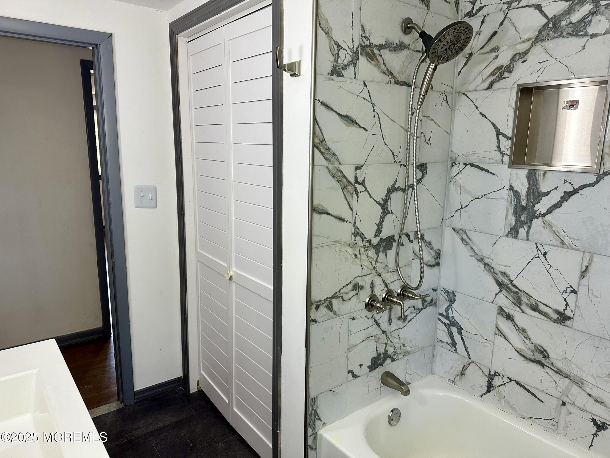 135 South Main Street Barnegat, NJ 08005 - Photo 14 of 35 a bathroom with a bathtub and shower