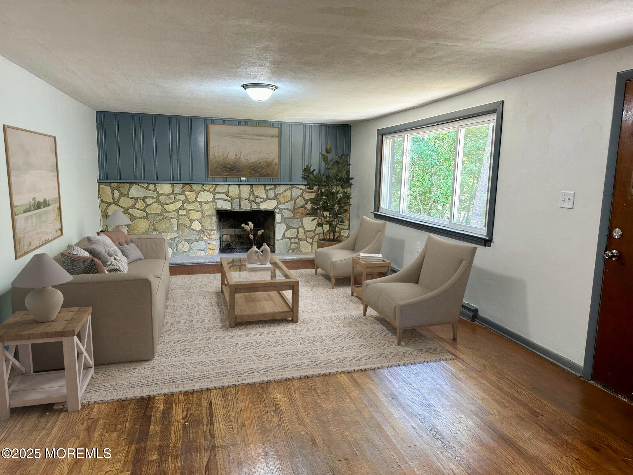 135 South Main Street Barnegat, NJ 08005 - Photo 24 of 35 a living room with furniture and a fireplace