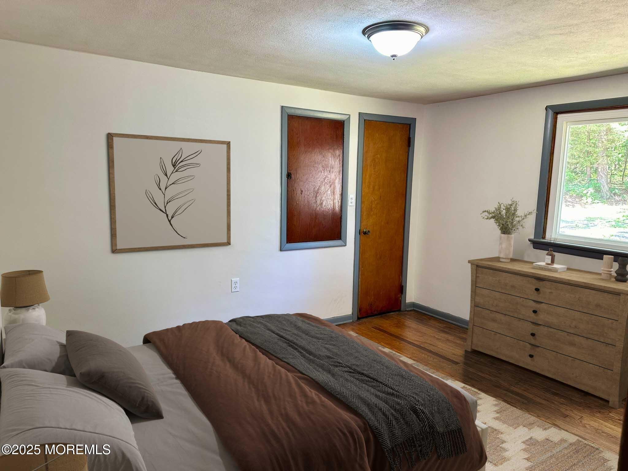 135 South Main Street Barnegat, NJ 08005 - Photo 29 of 35 a bedroom with a bed and a window