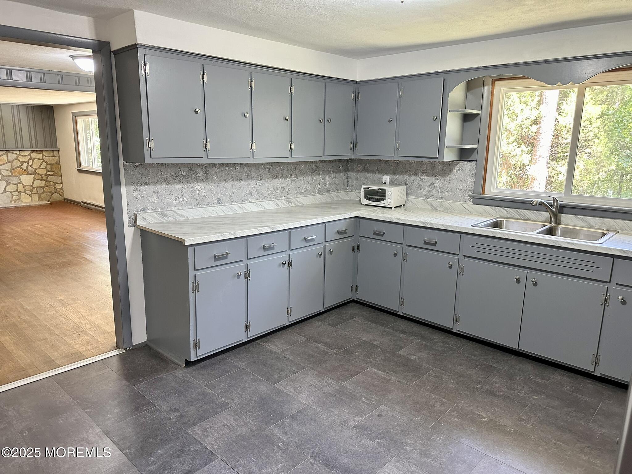 135 South Main Street Barnegat, NJ 08005 - Photo 7 of 35 a kitchen with a sink and cabinets