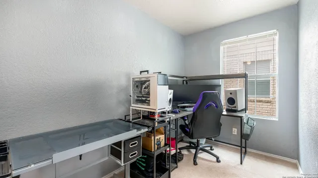 a view of workspace with fan