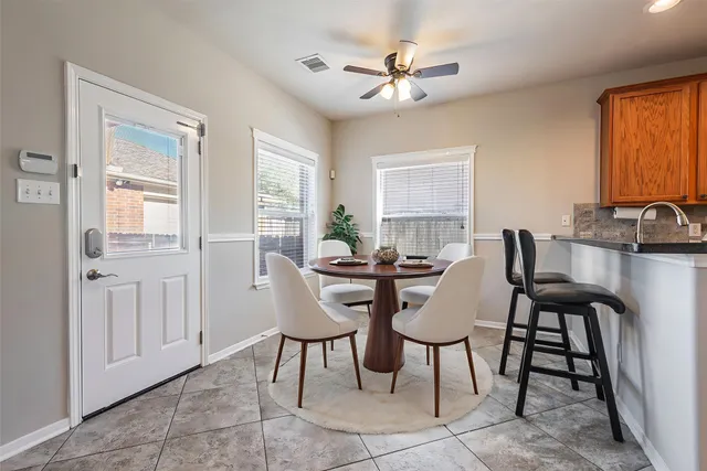 a view of a livingroom with furniture and window