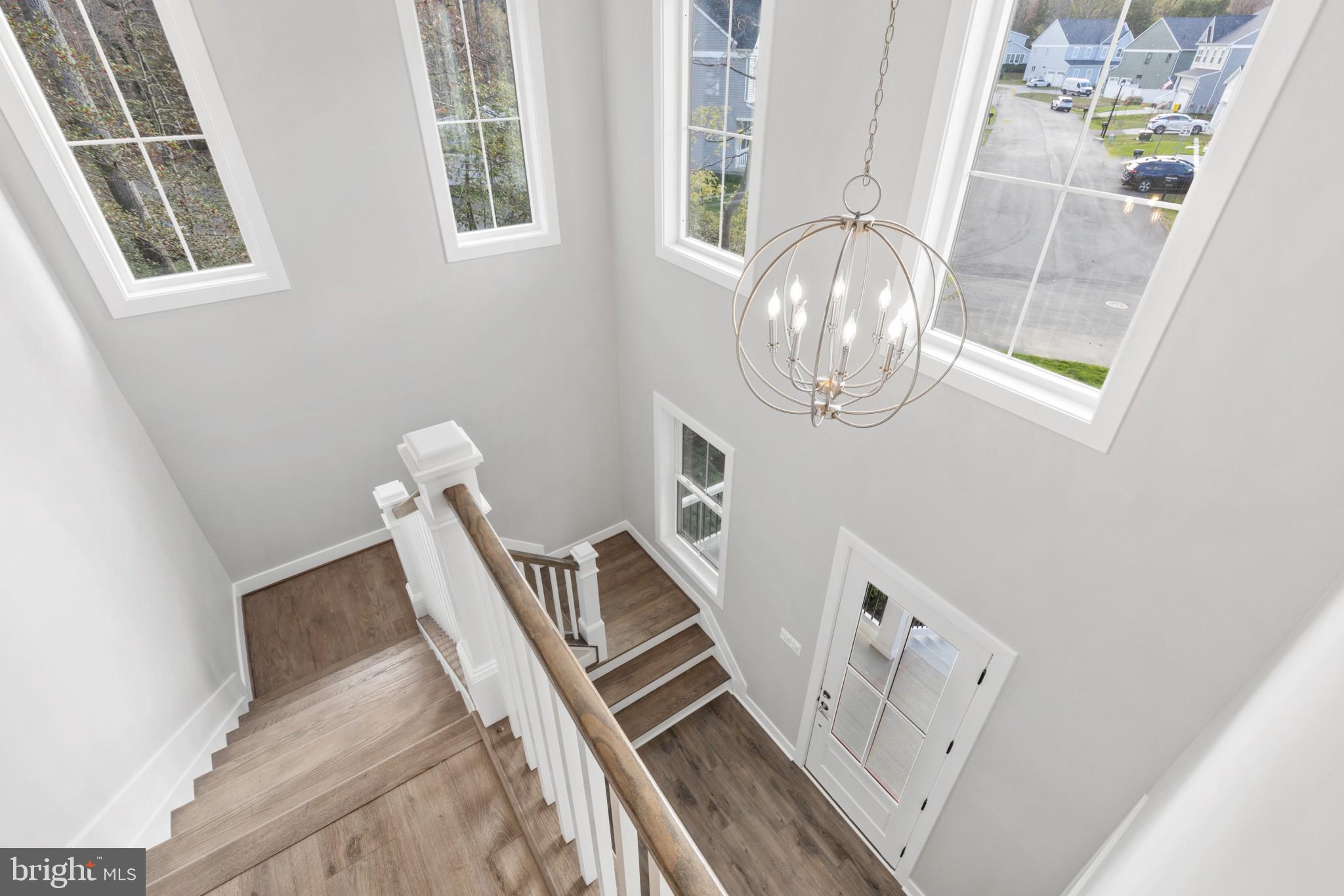 1402 Mccarter Lane Edgewater, MD 21037 - Photo 12 of 30 a view of an entryway with wooden floor