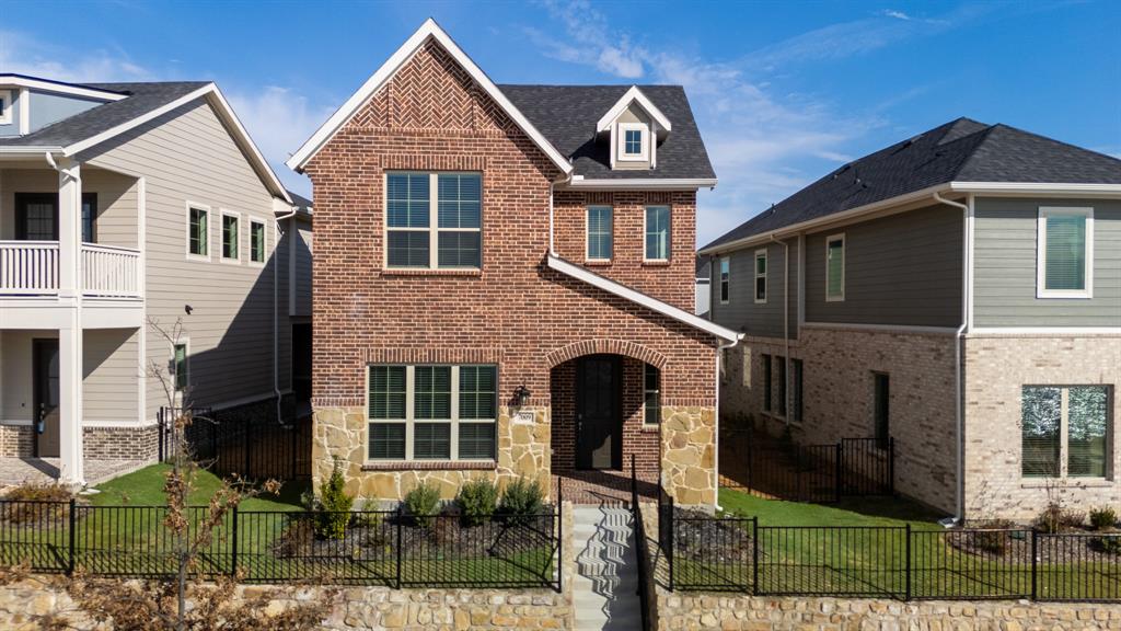 7009 Sunset Boulevard Rowlett, TX 75088 - Photo 34 of 35 a front view of a house with garden