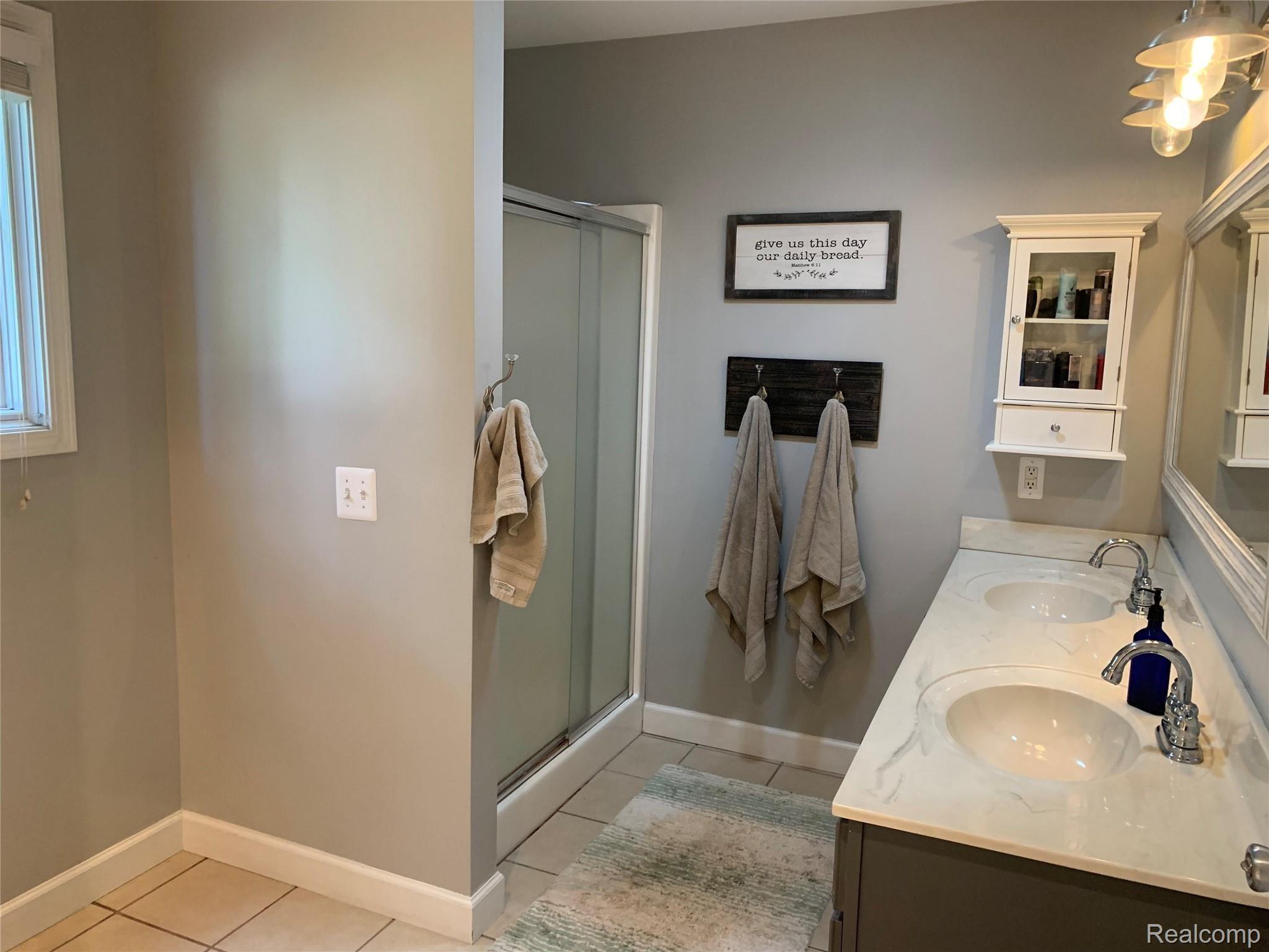 7453 Bergin Road Howell, MI 48843 - Photo 21 of 28 double sink.jpeg