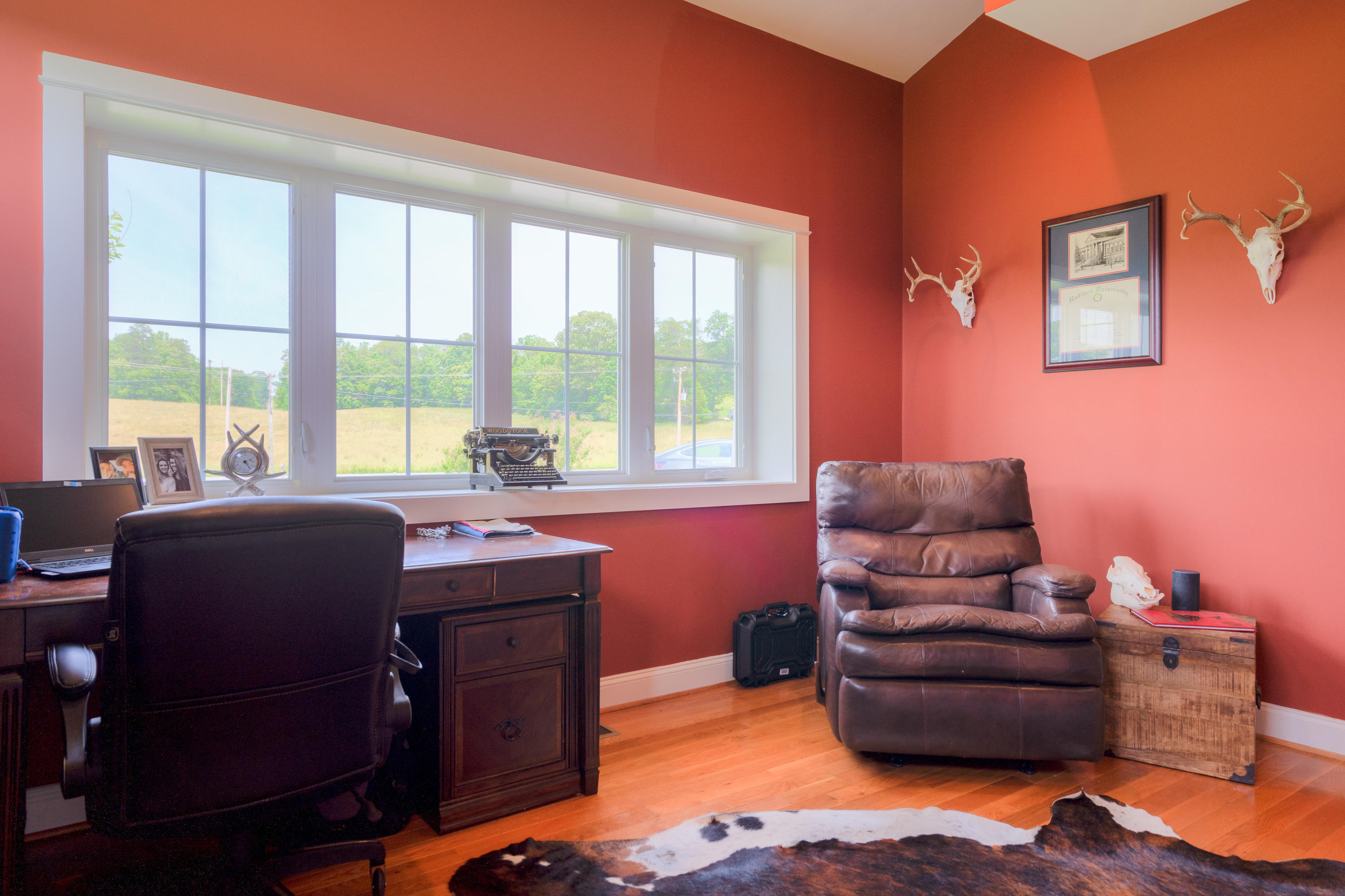 1839 Blue Ridge Springs Road Blue Ridge, VA 24064 - Photo 32 of 68 a living room with furniture and a large window