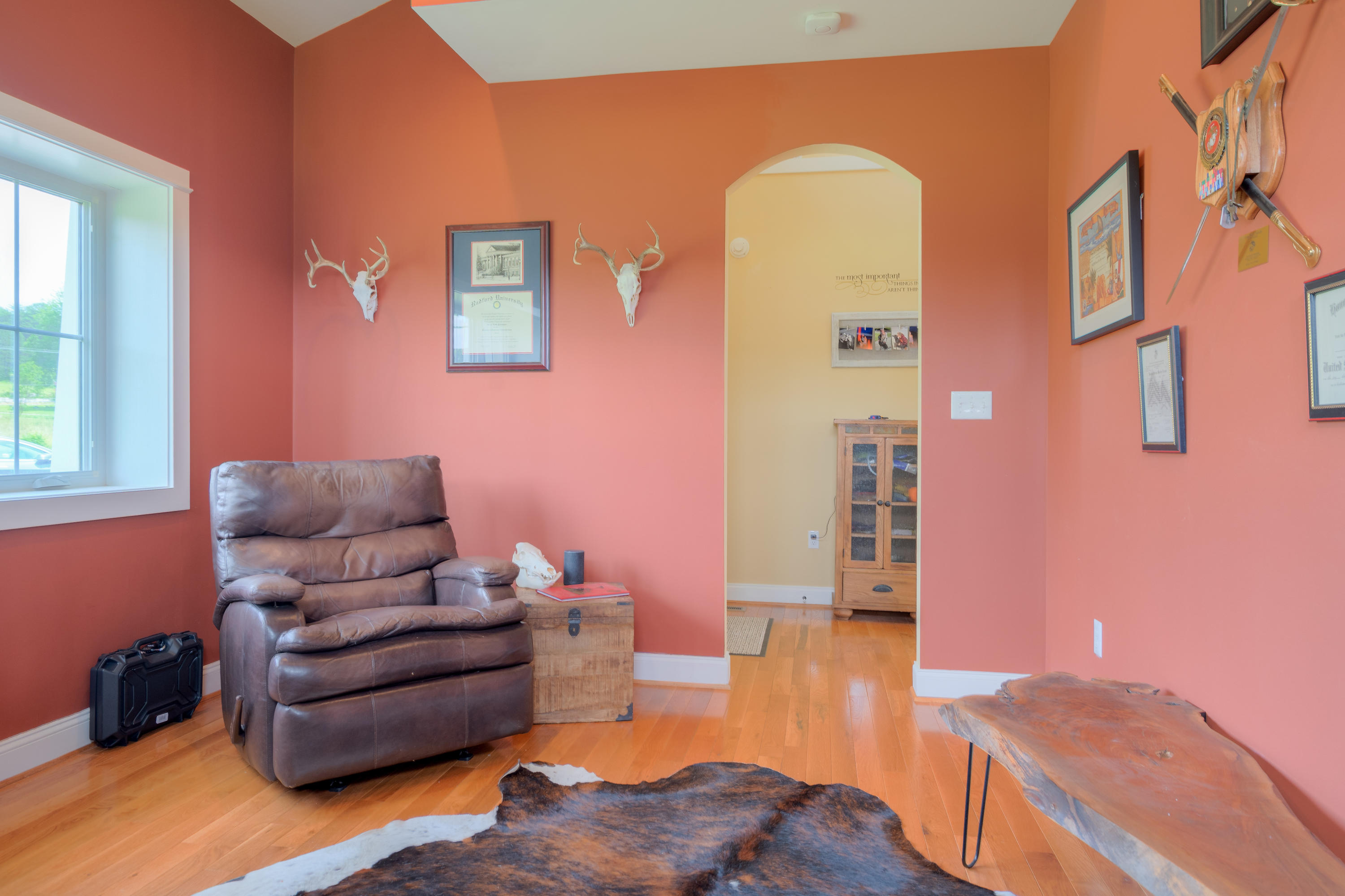 1839 Blue Ridge Springs Road Blue Ridge, VA 24064 - Photo 34 of 68 a living room with furniture and a wooden floor