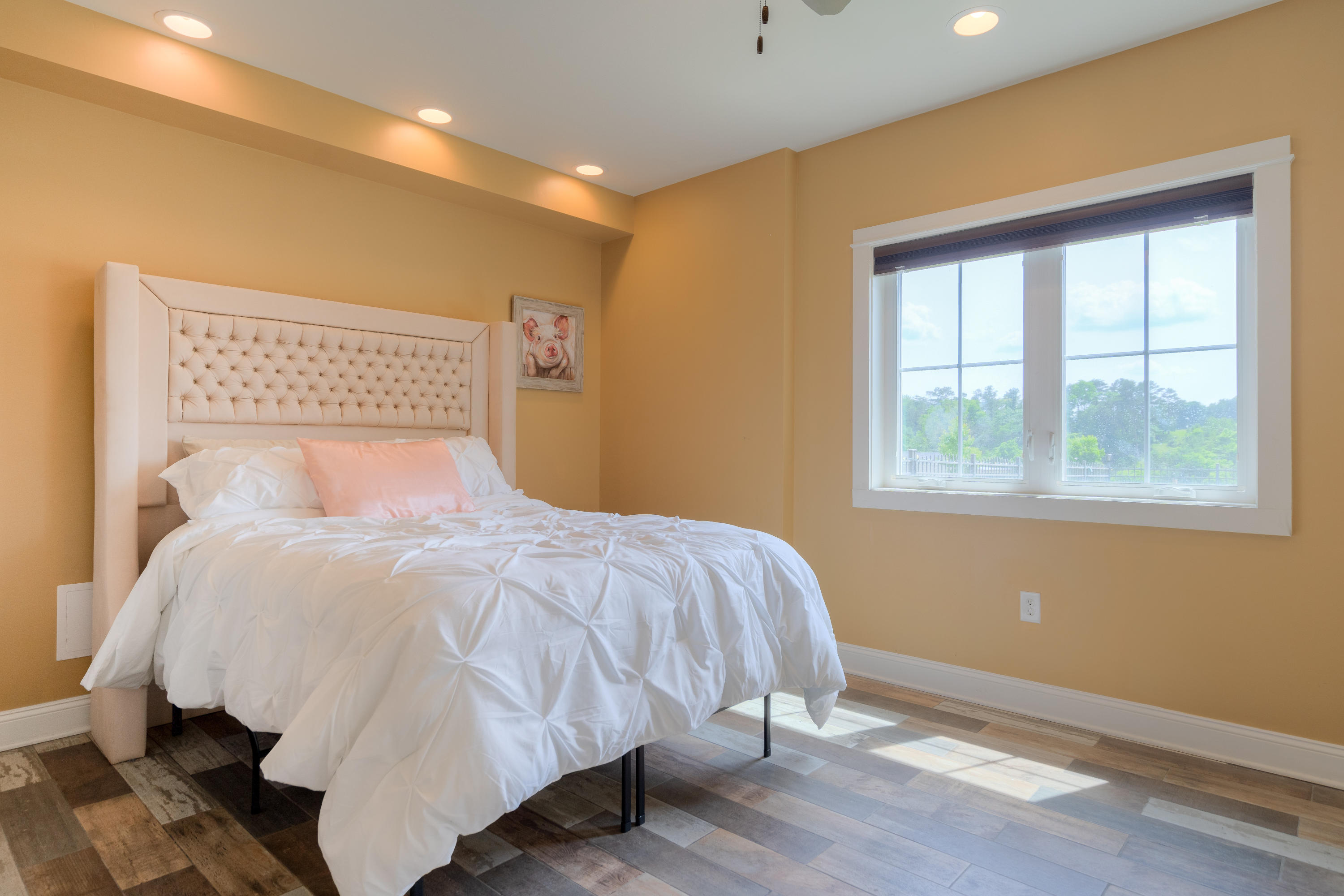 1839 Blue Ridge Springs Road Blue Ridge, VA 24064 - Photo 50 of 68 a large bed sitting in a bedroom next to a window