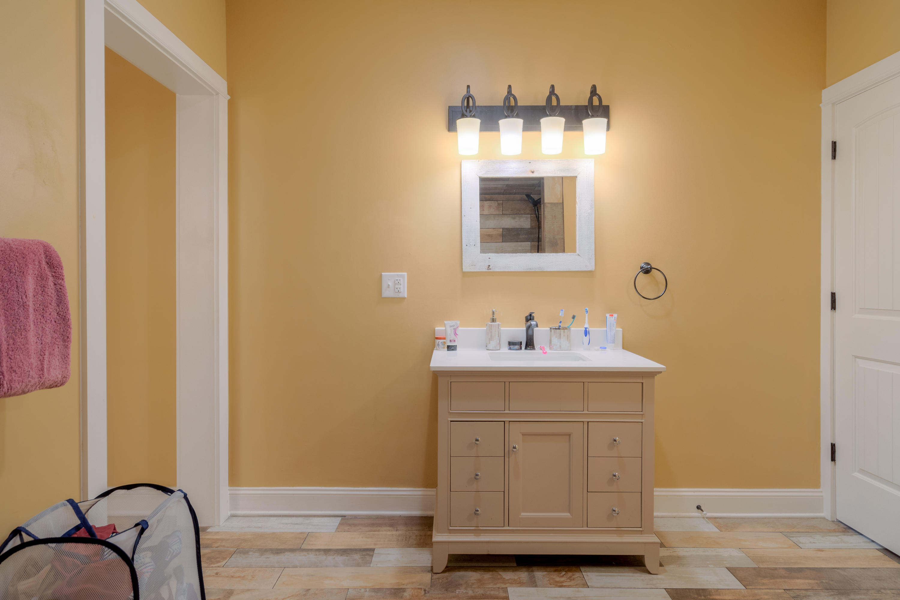 1839 Blue Ridge Springs Road Blue Ridge, VA 24064 - Photo 55 of 68 a bathroom with a sink and a mirror