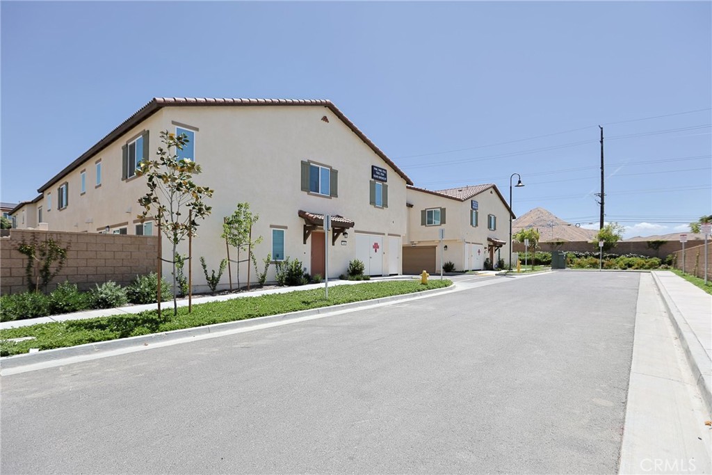 7486 Olive Grv Street Riverside, CA 92507 - Photo 46 of 57 a view of a house with a street