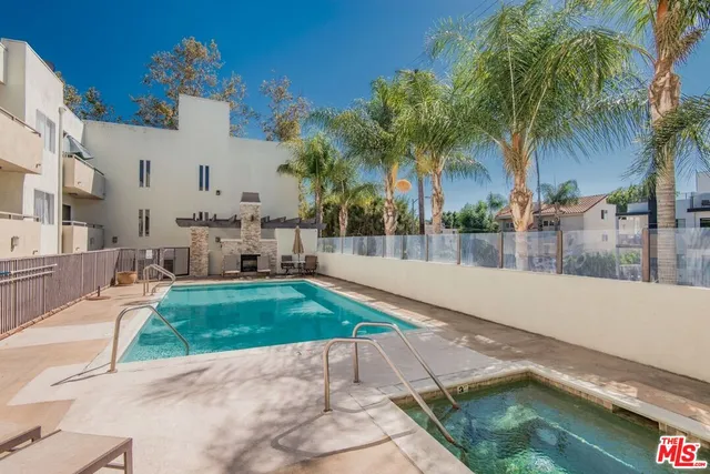 a view of swimming pool with a yard