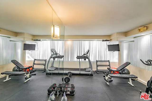 a view of parking garage with cars