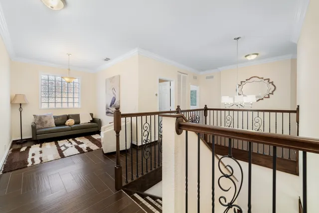 a view of entryway with wooden floor