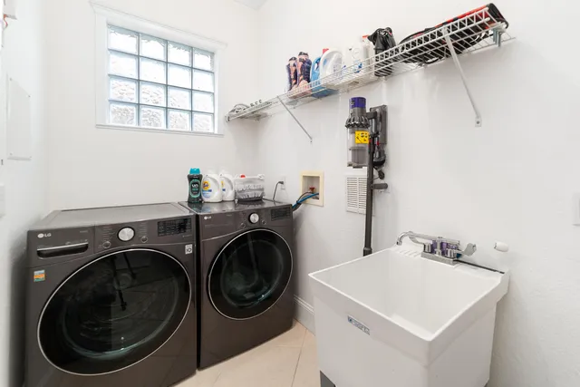 a utility room with dryer and washer