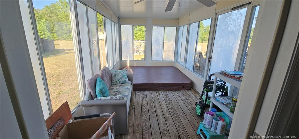 212 McIver Road Lumber Bridge, NC 28357 - Photo 13 of 28 a room with wooden floor and furniture