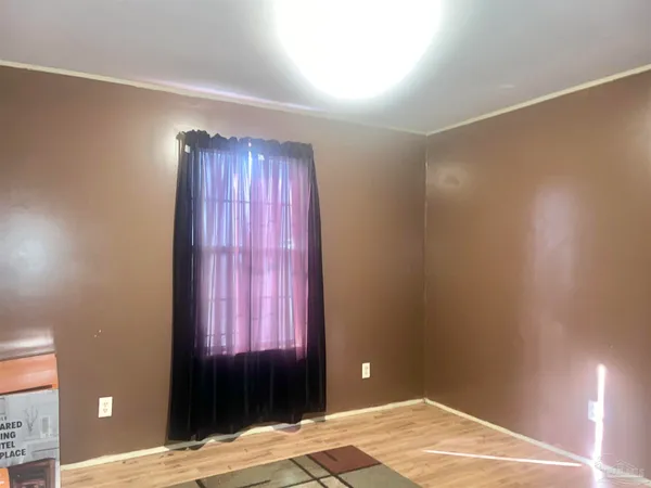 a view of a livingroom with a workspace