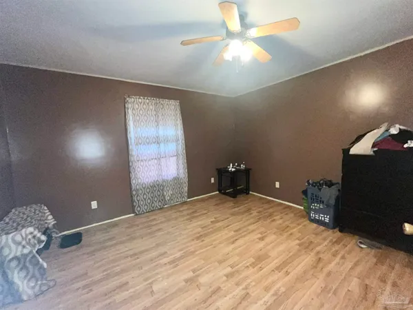 a view of a room with a flat screen tv