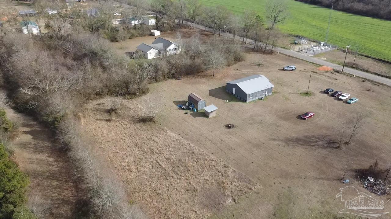 1482 Smith Dairy Road Atmore, AL 36502 - Photo 21 of 34 an aerial view of house with yard