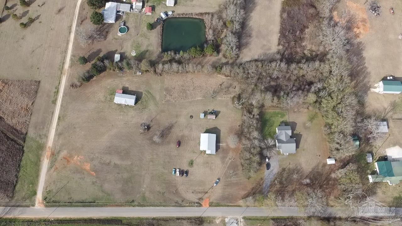 1482 Smith Dairy Road Atmore, AL 36502 - Photo 25 of 34 an aerial view of a house