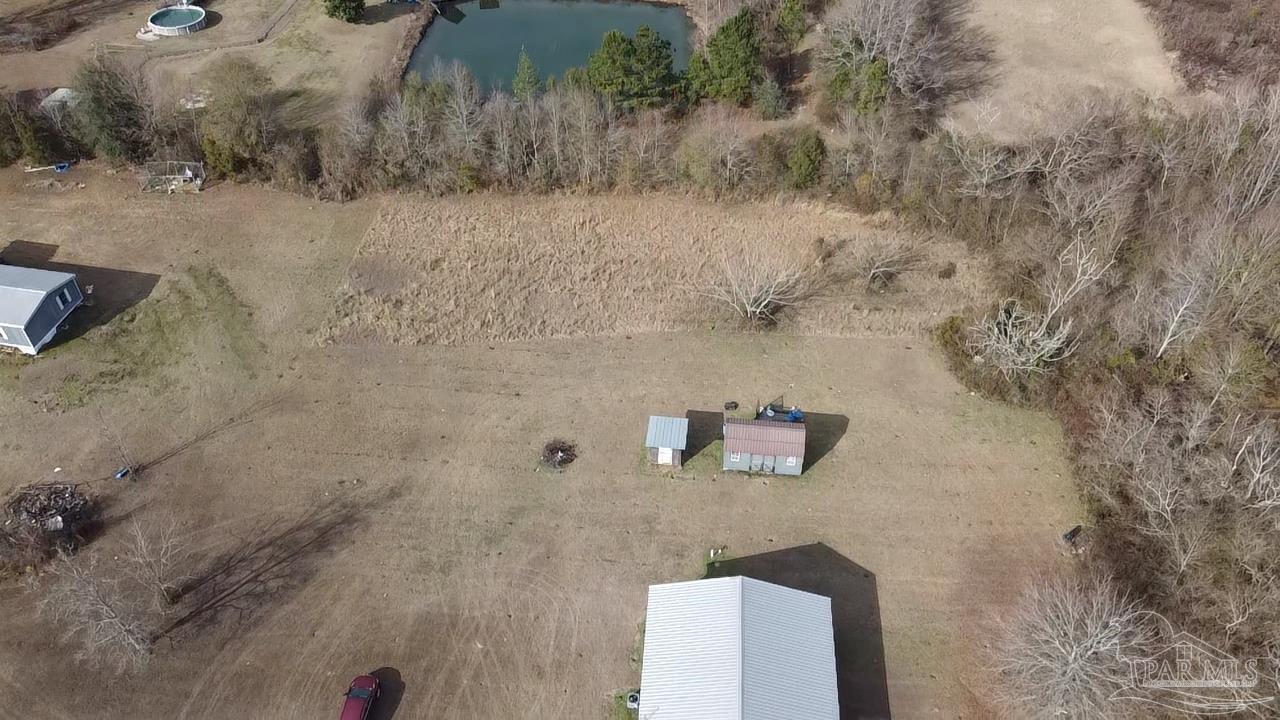 1482 Smith Dairy Road Atmore, AL 36502 - Photo 26 of 34 a bathroom with a shower and a sink
