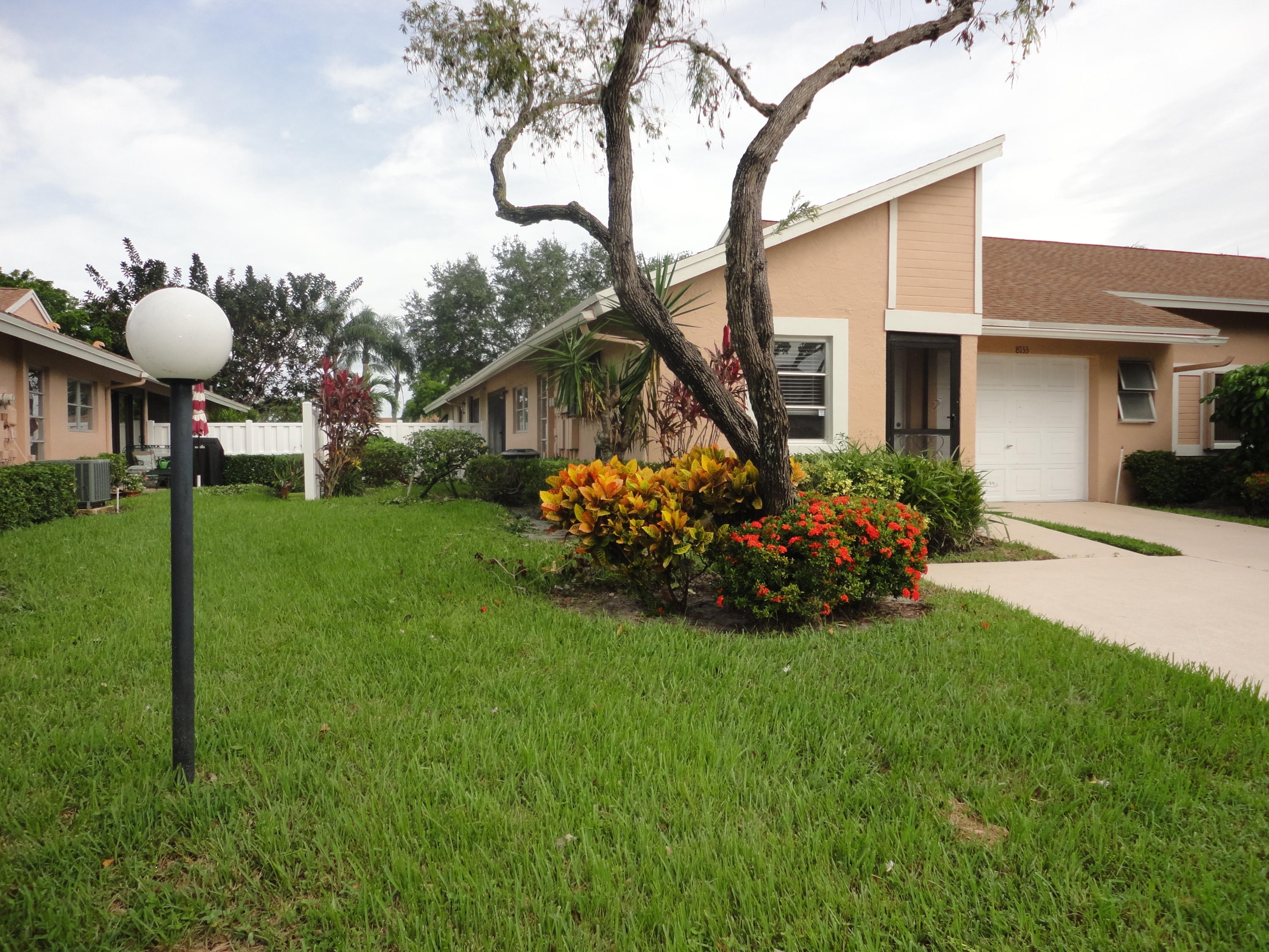 8133 Springtree Road, Unit C Boca Raton, FL 33496 - Photo 2 of 35 Side open patio