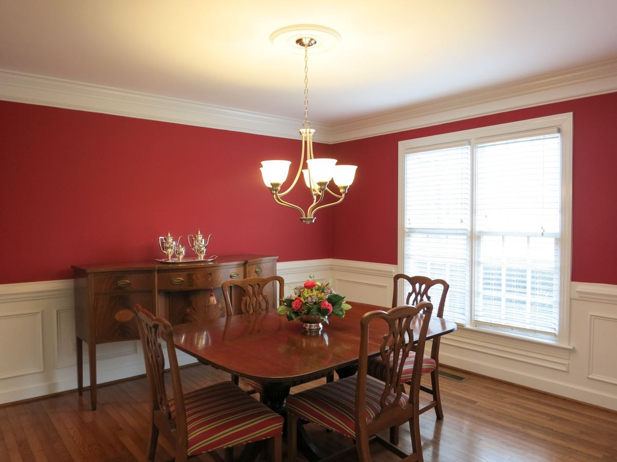 9305 Dawnshire Road Raleigh, NC 27615 - Photo 3 of 25 The formal Dining Rm off the Foyer offers hardwood flr, panel wainscot, chair rail & brushed nickel light fixture. Dining Room