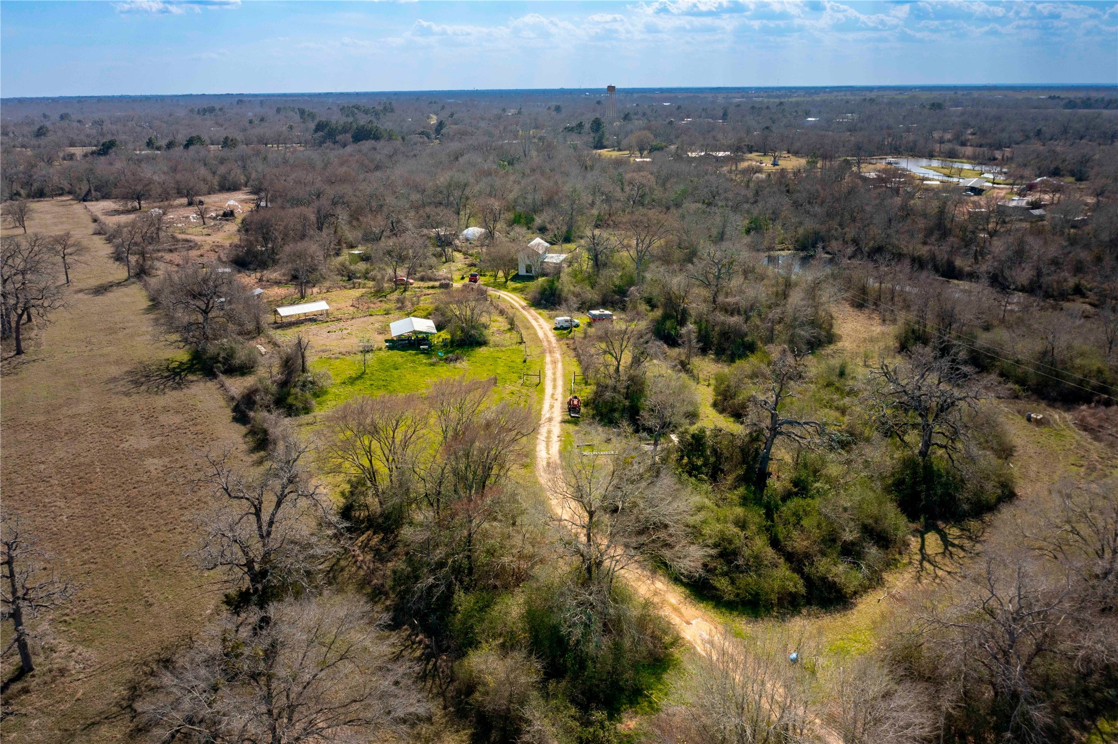 38241 Wiggins Road Hempstead, TX 77445 - Photo 18 of 48 an aerial view of multiple house