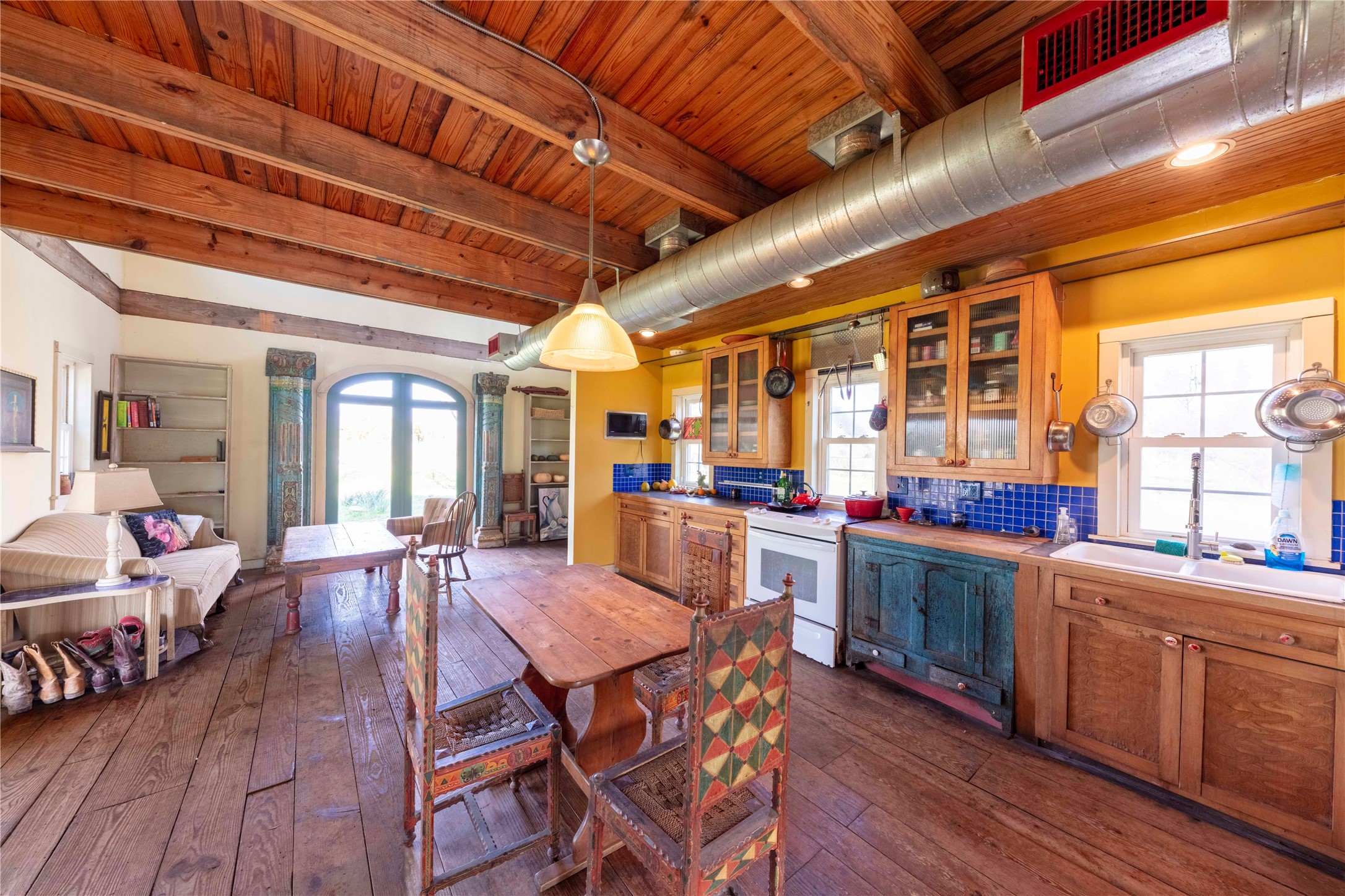 38241 Wiggins Road Hempstead, TX 77445 - Photo 22 of 48 a view of a dining room with furniture window and wooden floor