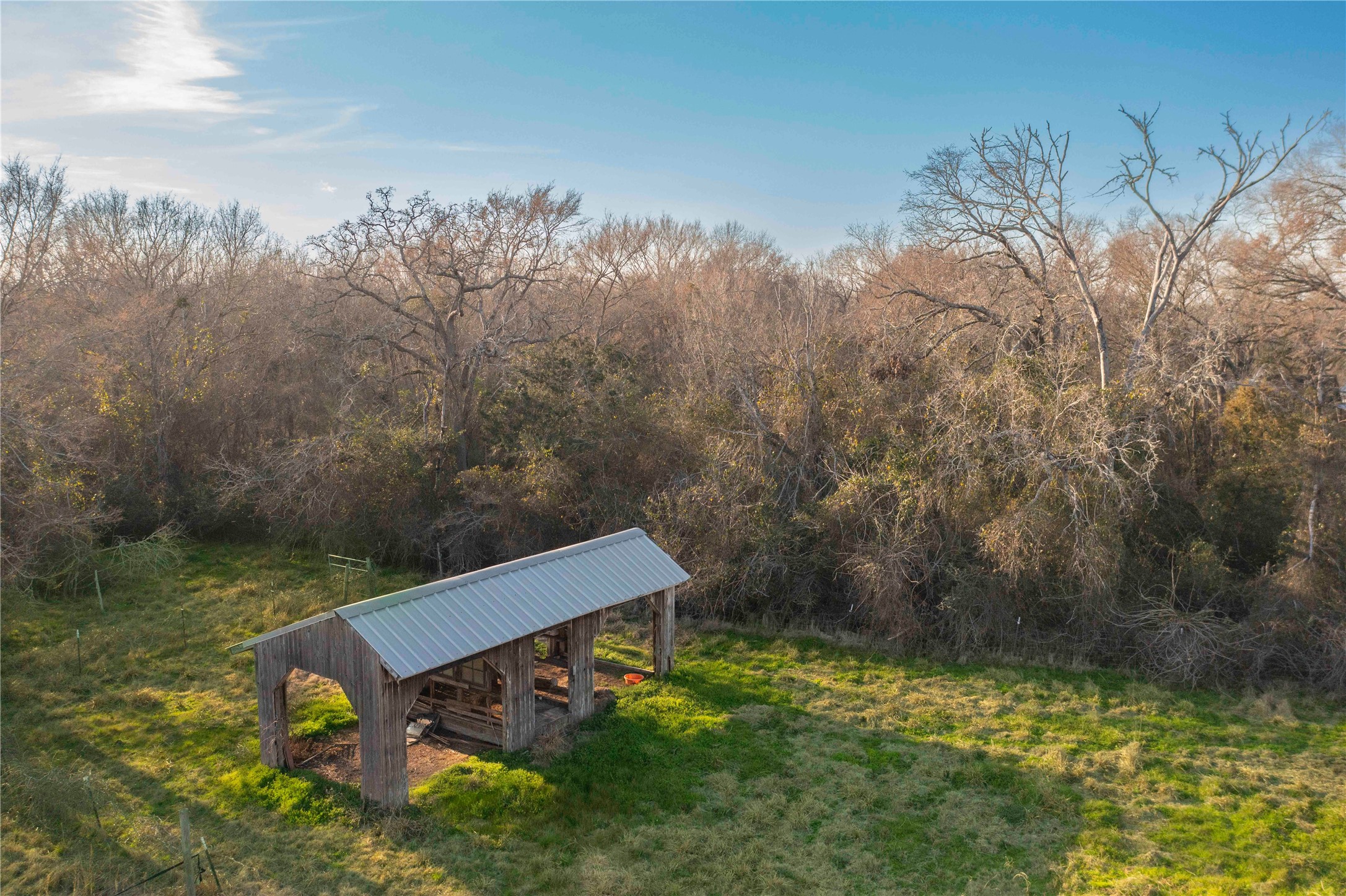 38241 Wiggins Road Hempstead, TX 77445 - Photo 42 of 48 a view of a bench in a backyard