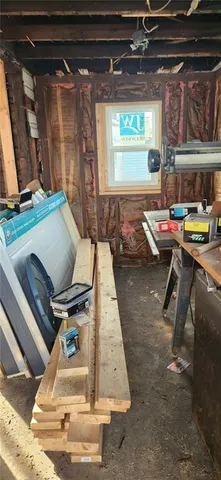 a room with furniture and a flat screen tv