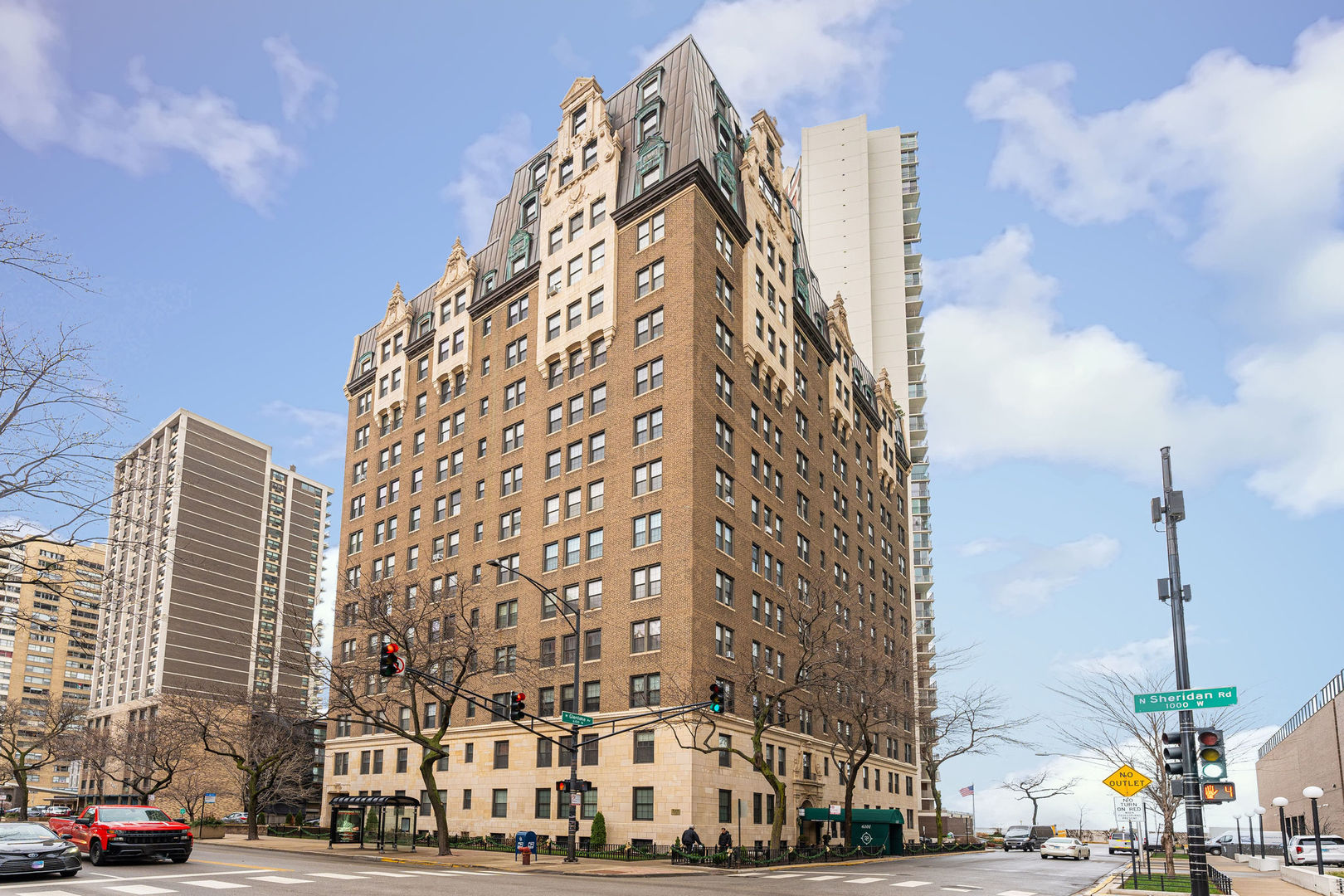 6101 North Sheridan Road, Unit 8G Chicago, IL 60660 - Photo 1 of 15 a view of a city with tall buildings