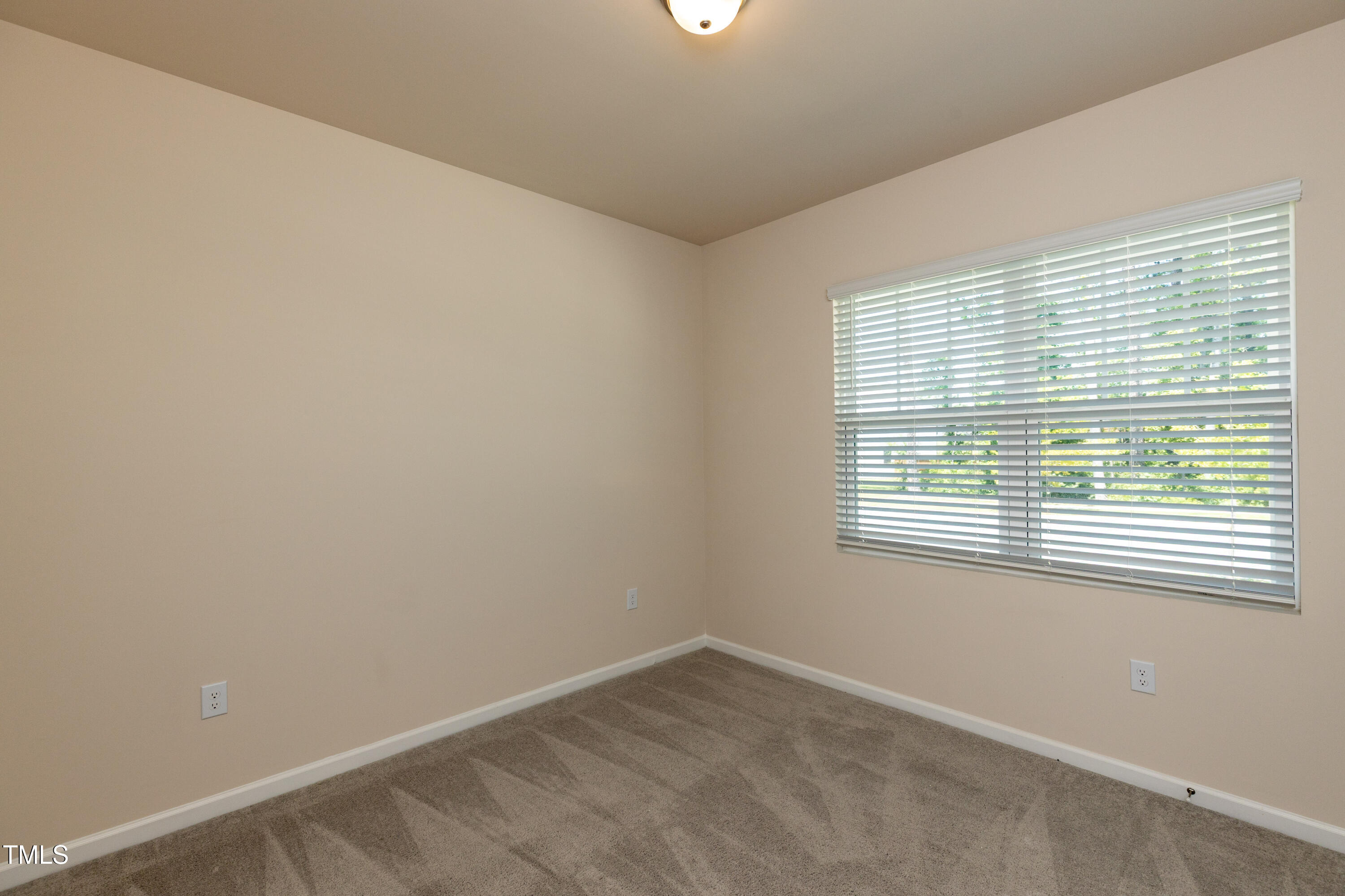 1444 Heron Pond Street Raleigh, NC 27604 - Photo 14 of 37 a room that has a window in it