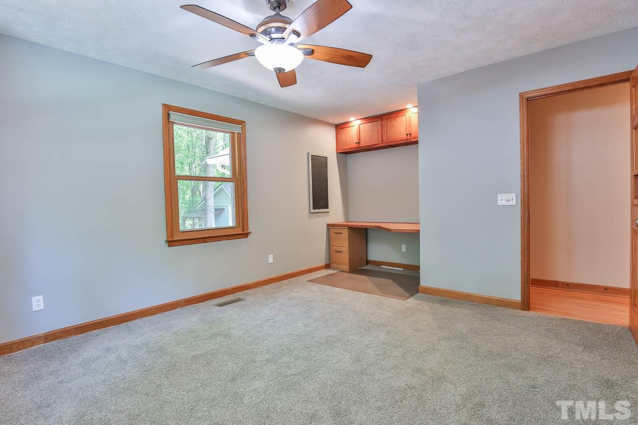 508 Ridge View Pittsboro, NC 27312 - Photo 15 of 30 This room already has a built in desk and lots of built in shelves for books, toys or display your treasures