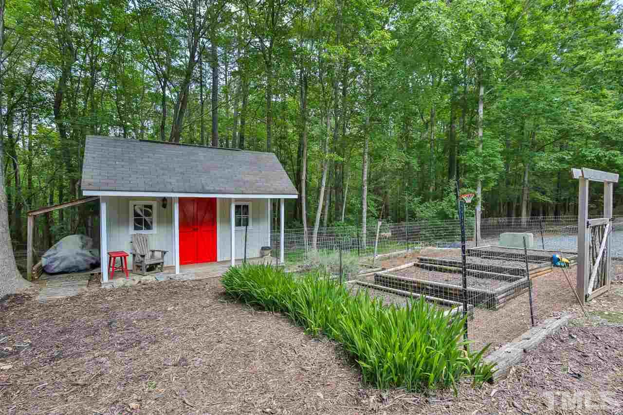 508 Ridge View Pittsboro, NC 27312 - Photo 24 of 30 Storage building with double doors for easy access for your mower and bicycles!