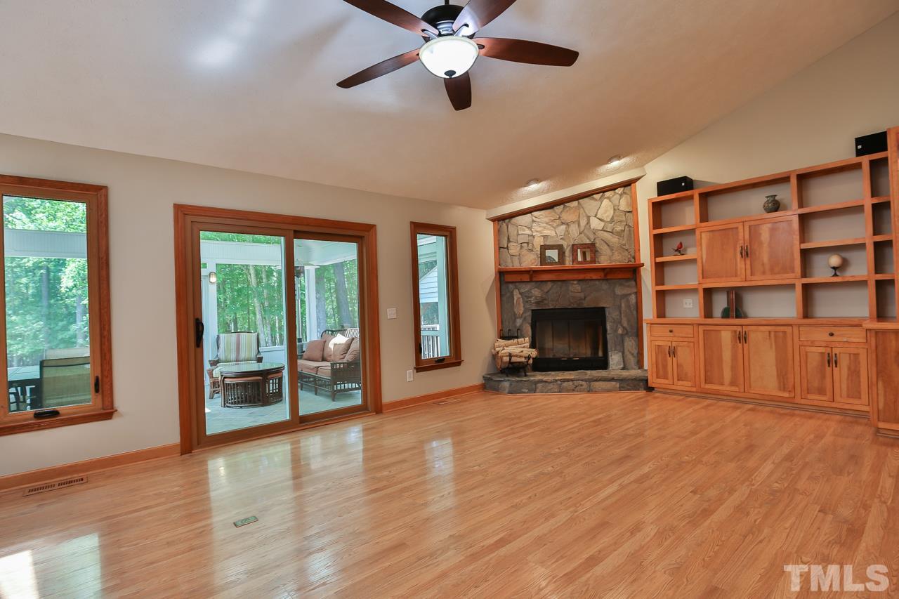 508 Ridge View Pittsboro, NC 27312 - Photo 7 of 30 Cozy living room with fireplace that connects directly to the outdoor living