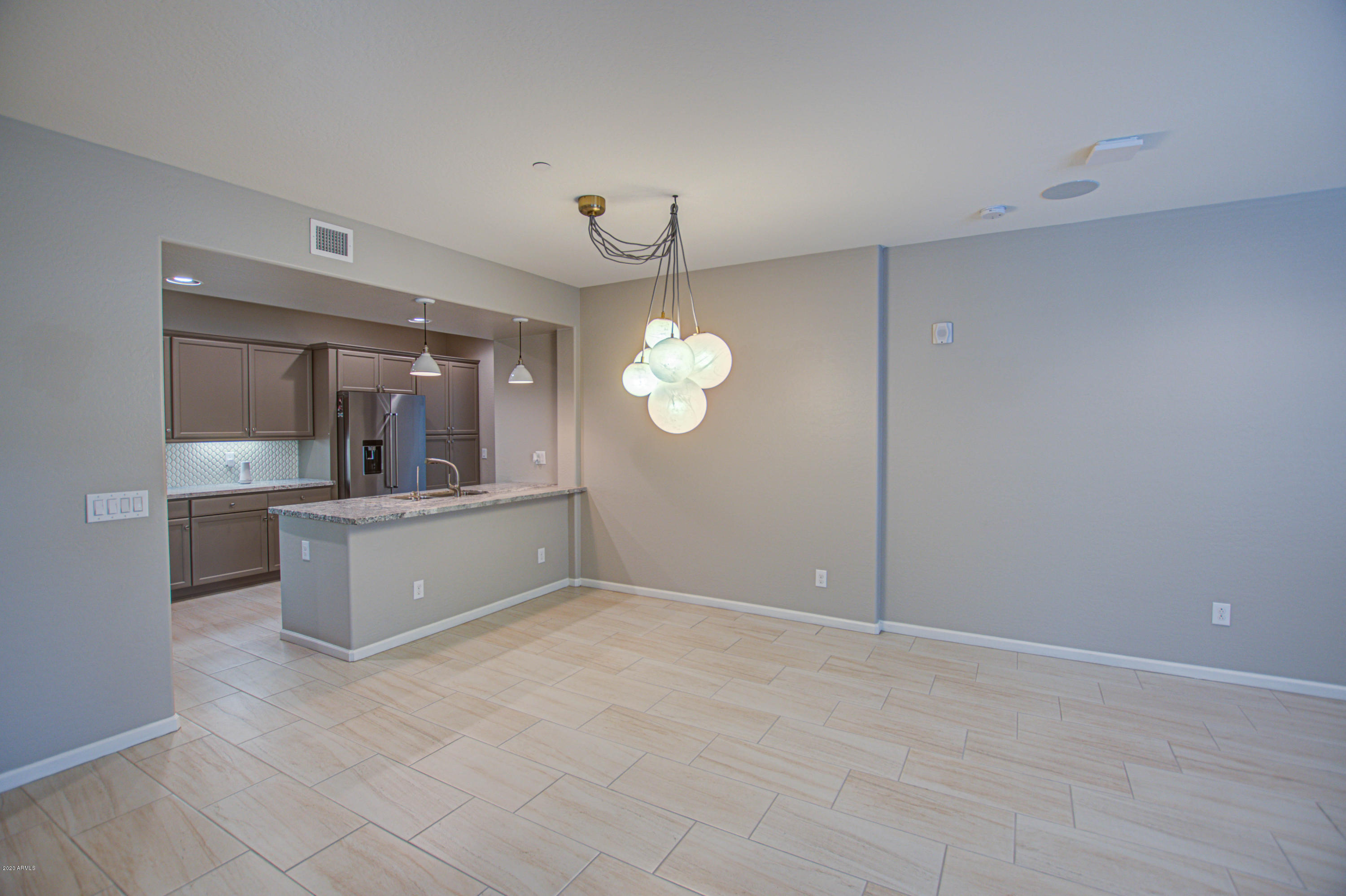 3935 East Rough Rider Road, Unit 1372 Phoenix, AZ 85050 - Photo 11 of 73 Family Room 4