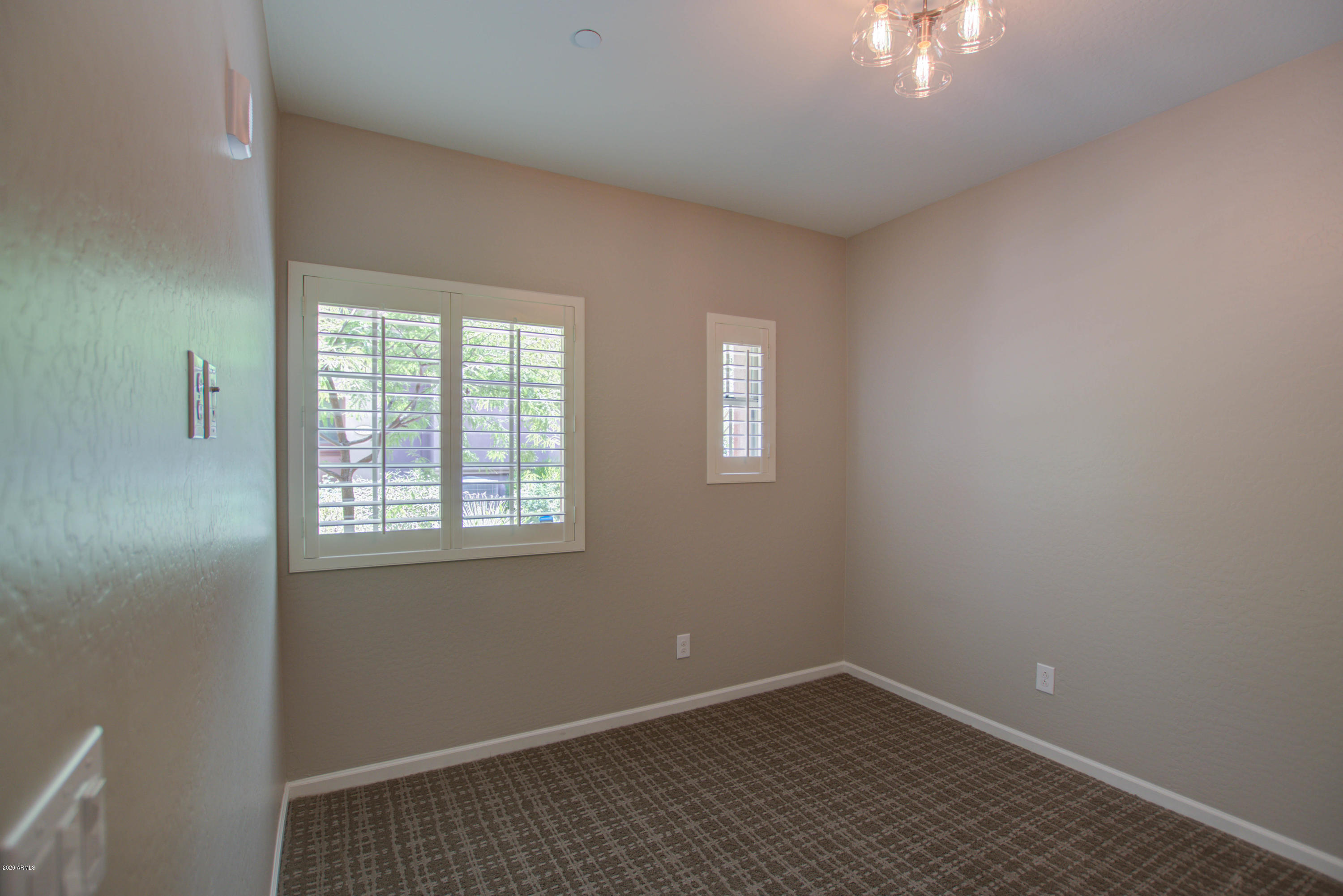 3935 East Rough Rider Road, Unit 1372 Phoenix, AZ 85050 - Photo 33 of 73 Bedroom 2-pic 1