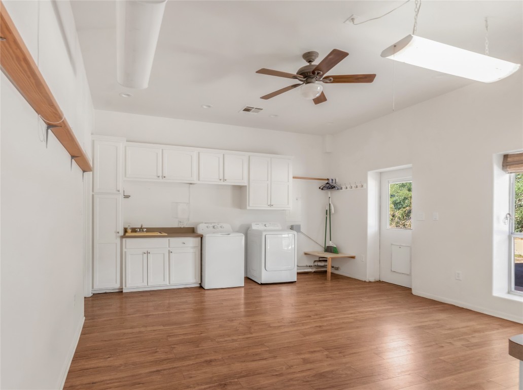 1004 22 Hills Road Gause, TX 77857 - Photo 32 of 40 a view of a kitchen with sink and wooden floor