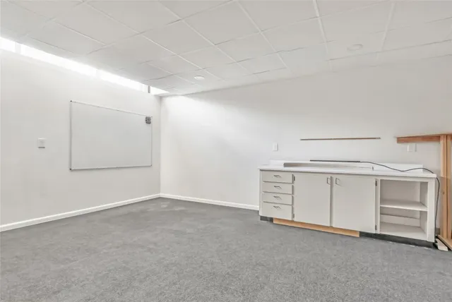 a view of a storage & utility room with closet