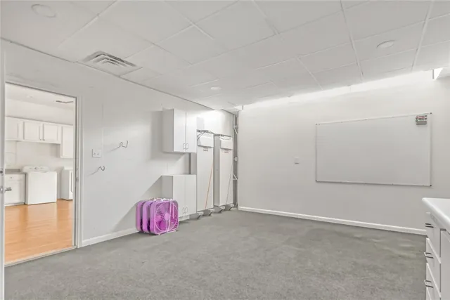 a bathroom with a sink double vanity and a mirror