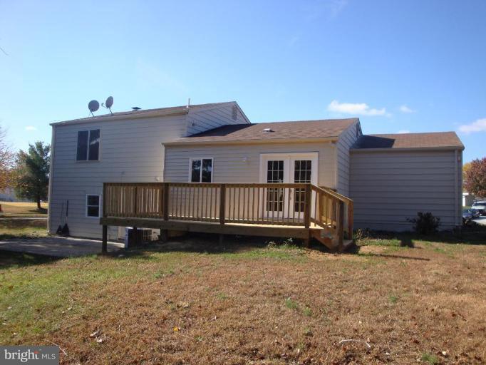 3702 Stonesboro Road Fort Washington, MD 20744 - Photo 2 of 8 a view of a house with a yard