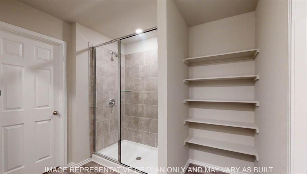 10325 Altair Drive Waco, TX 76708 - Photo 11 of 15 a bathroom with a shower