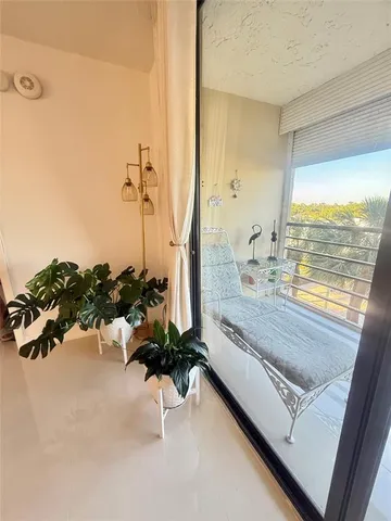 a bath room with a large window