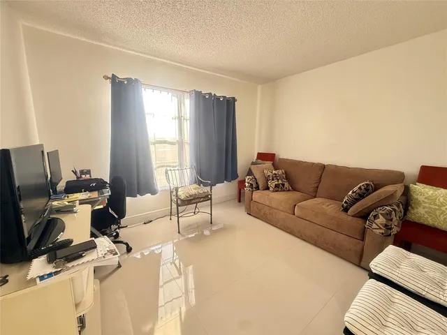 a bathroom with a sink a toilet and a bathtub