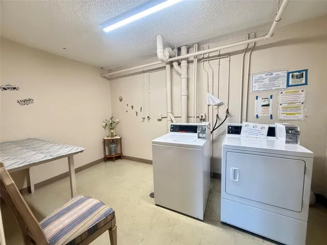 a view of cars parked in front of a building